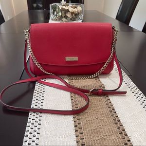 Kate Spade Bag in Red. With gold chain and a detachable strap.